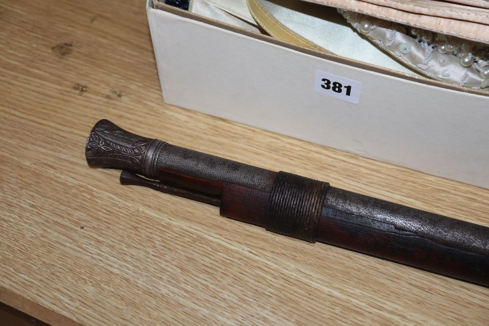 A 19th century percussion cap musket and an Eastern musket
